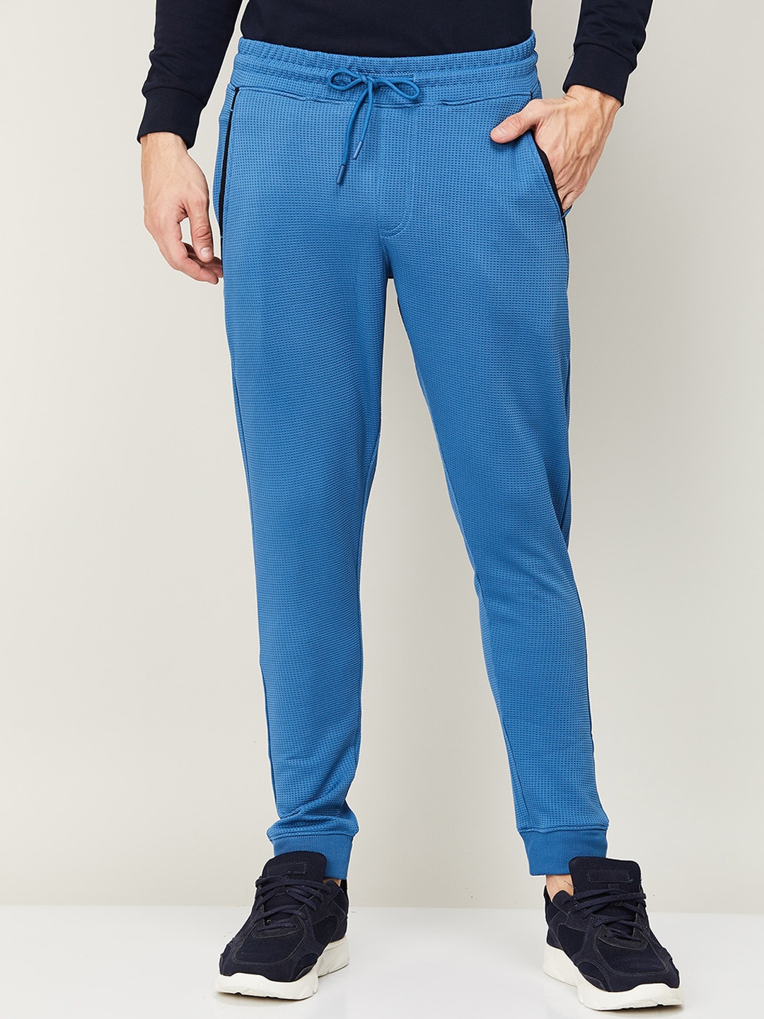 

Fame Forever by Lifestyle Men Blue Solid Slim-Fit Track Pants