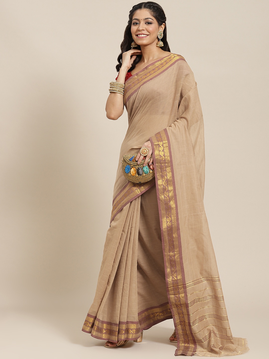 

Ishin Beige Solid Zari Cotton Blend Saree
