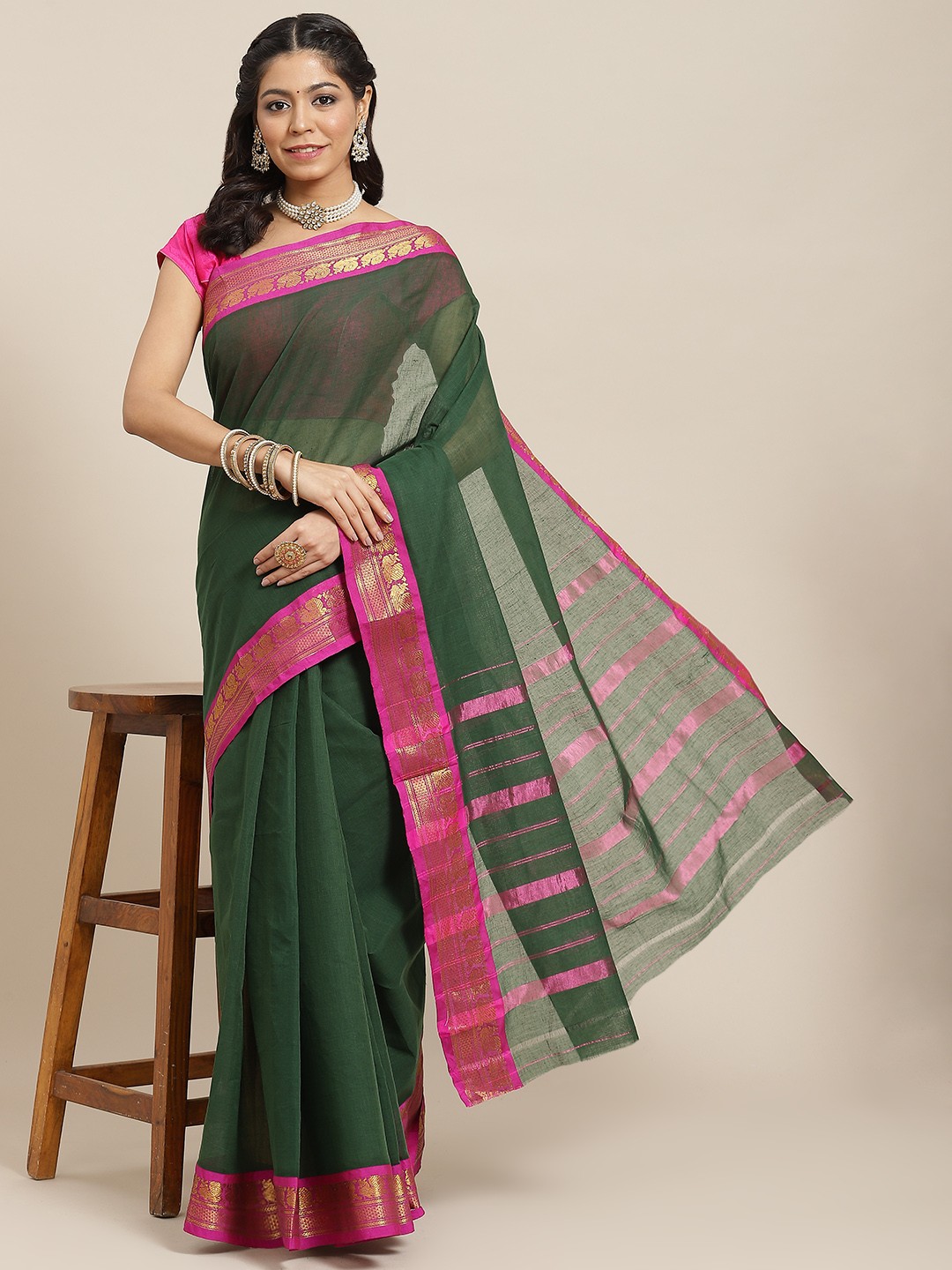 

Ishin Green Solid Cotton Blend Saree