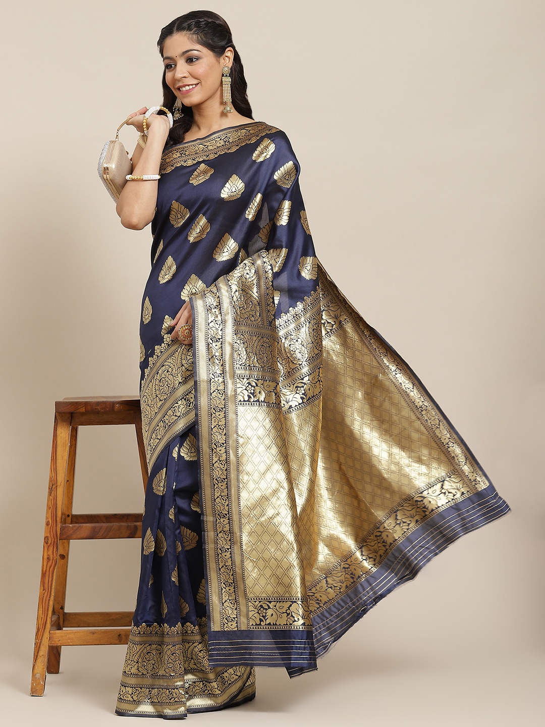 

Ishin Navy Blue & Golden Ethnic Motifs Zari Art Silk Banarasi Saree