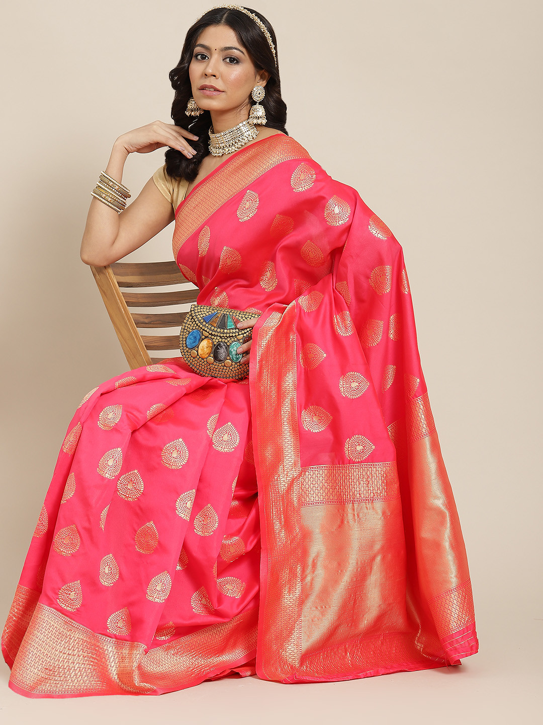 

Ishin Pink & Golden Ethnic Motifs Zari Art Silk Banarasi Saree