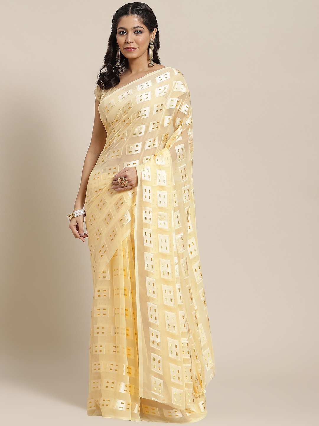 

Ishin Cream-Coloured & Golden Woven Design Poly Georgette Saree