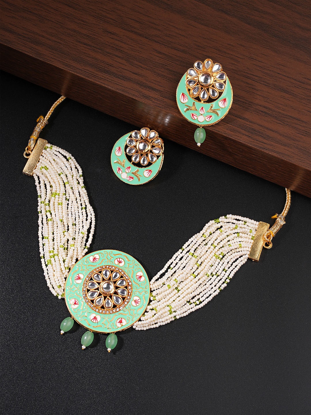 

Yellow Chimes Gold-Plated Green & White Kundan Studded Jewellery Set