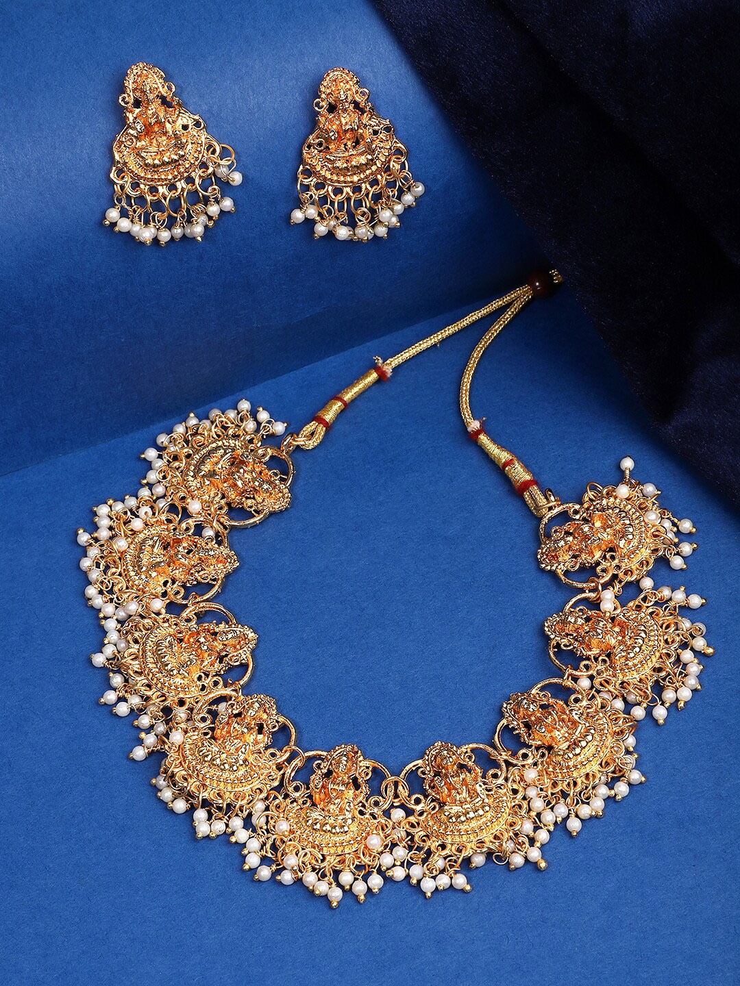 

Yellow Chimes Women Gold-Plated White Beaded Temple Jewellery Set