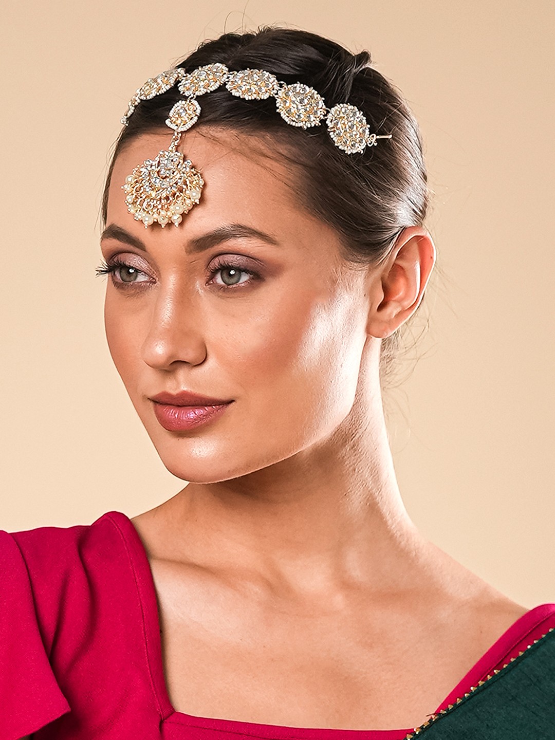 

Yellow Chimes Gold-Plated & White Kundan Studded Mathapati