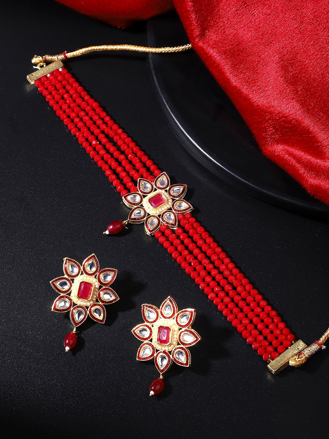 

Yellow Chimes Gold-Plated Red & White Stone-Studded & Beaded Jewellery Set
