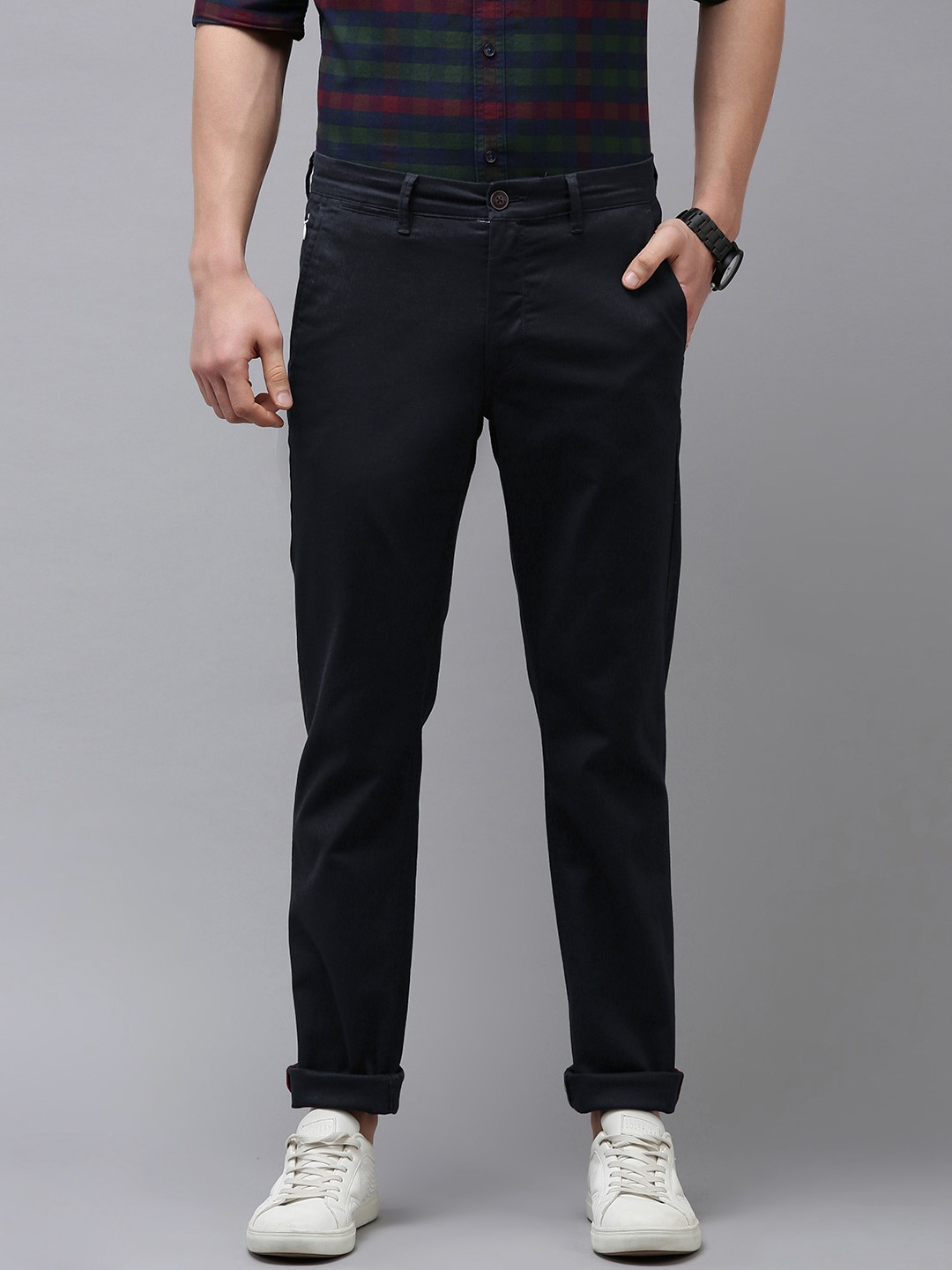 

Van Heusen Sport Men Navy Blue Self Design Textured Slim Fit Mid-Rise Plain Woven Trousers