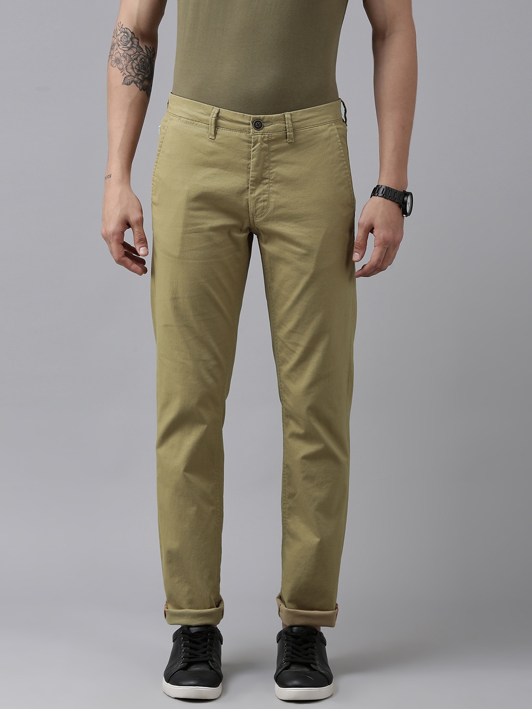 

Van Heusen Sport Men Khaki Solid Slim Fit Mid-Rise Plain Woven Flat-Front Trousers