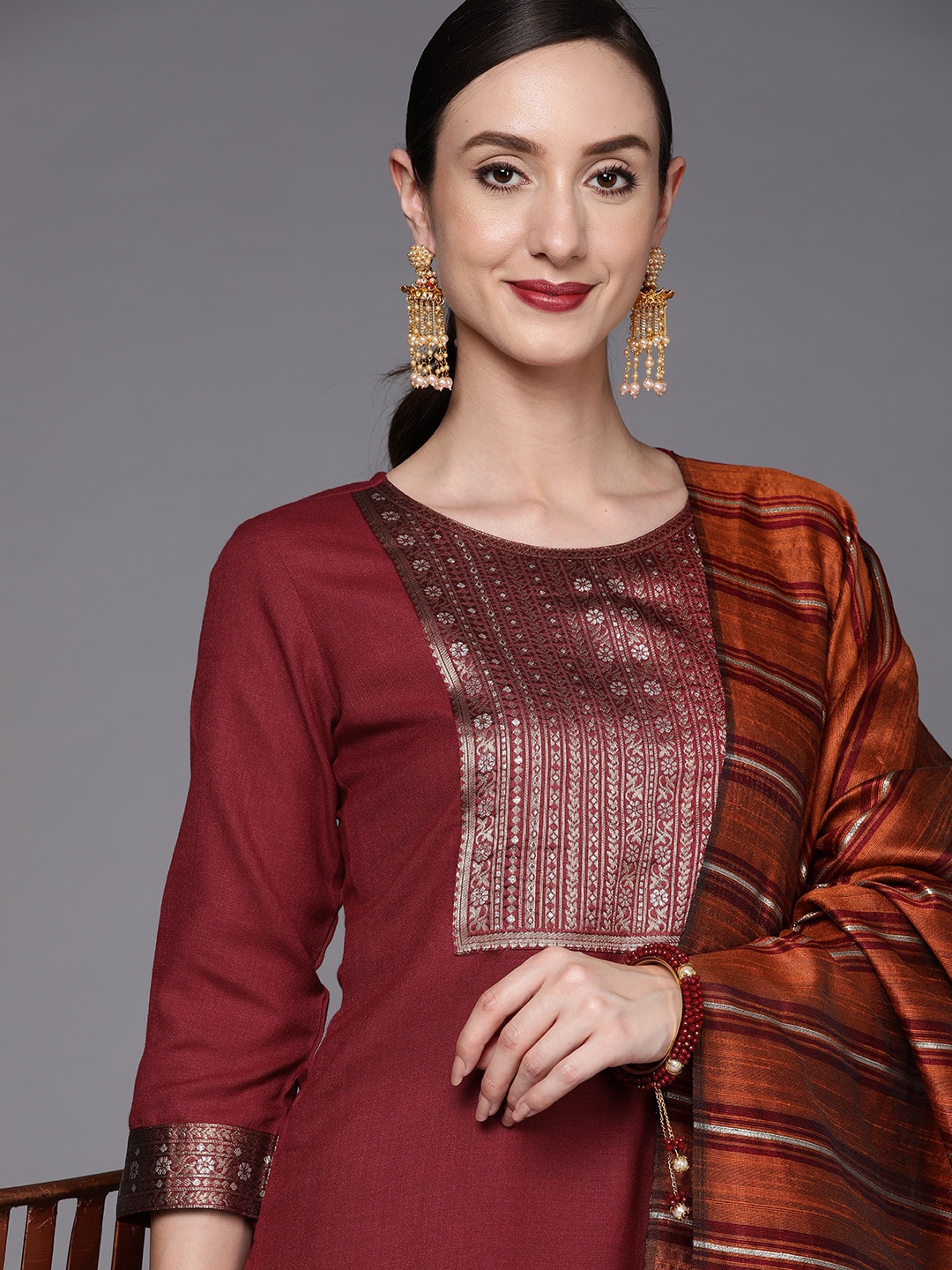 

Indo Era Women Maroon Yoke Design Kurta with Palazzos & Dupatta