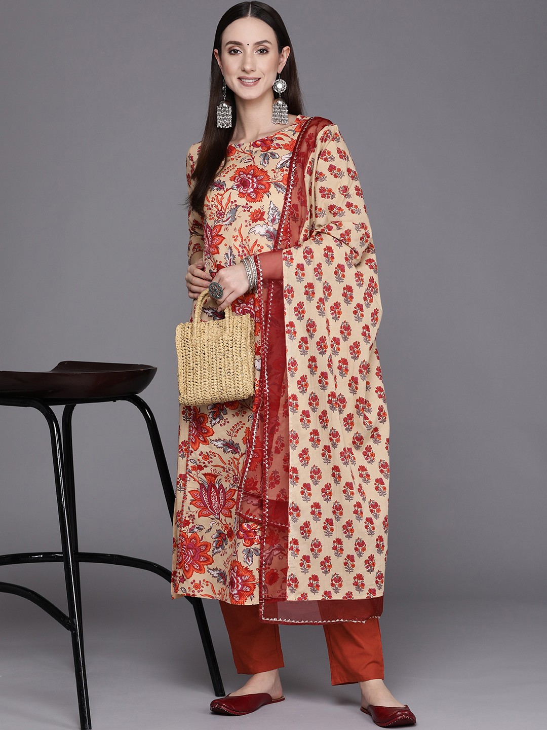 

Indo Era Women Beige & Orange Floral Printed Kurta with Trousers & With Dupatta