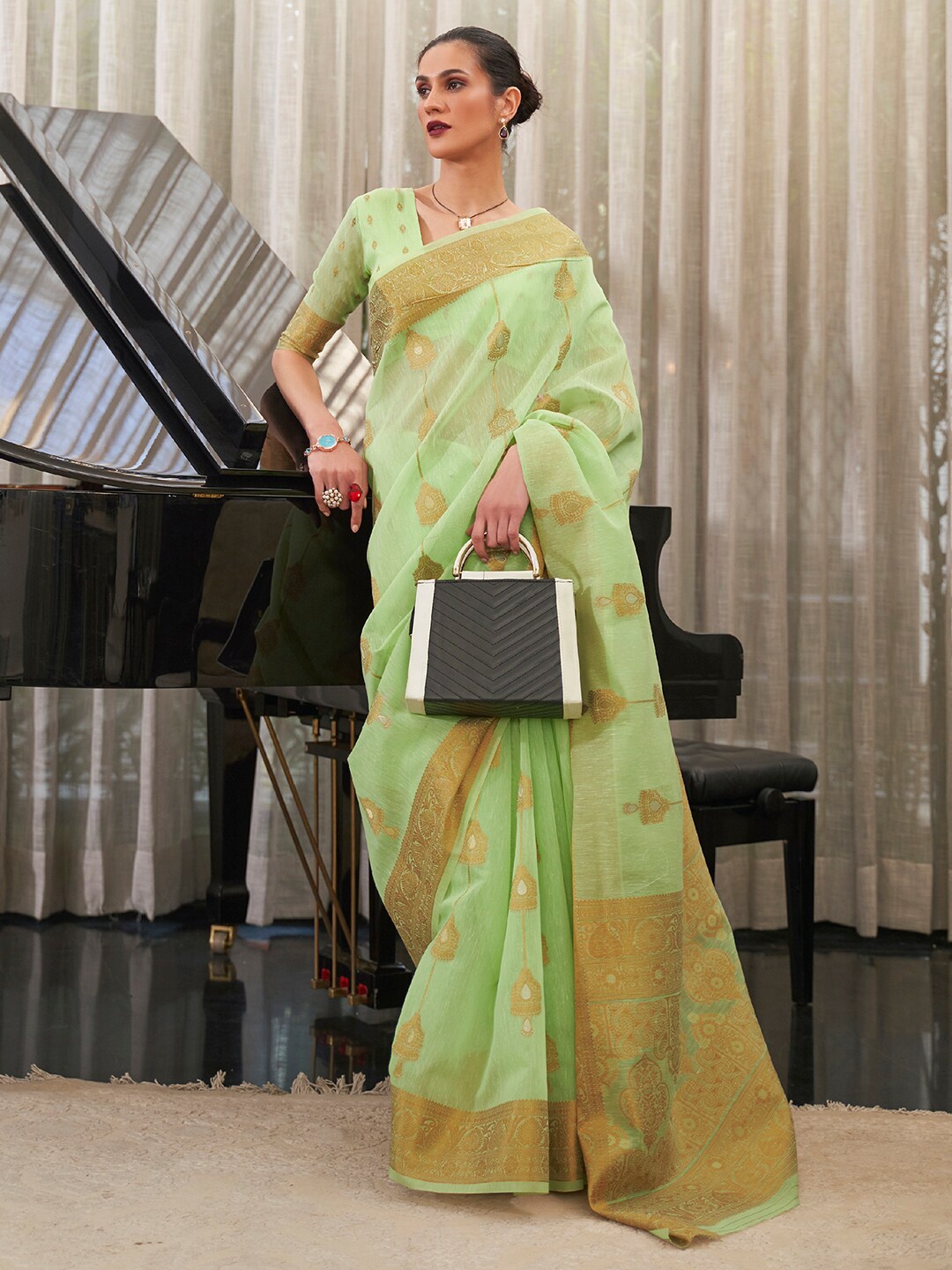 

Mitera Green & Gold-Toned Woven Design Zari Pure Linen Banarasi Saree