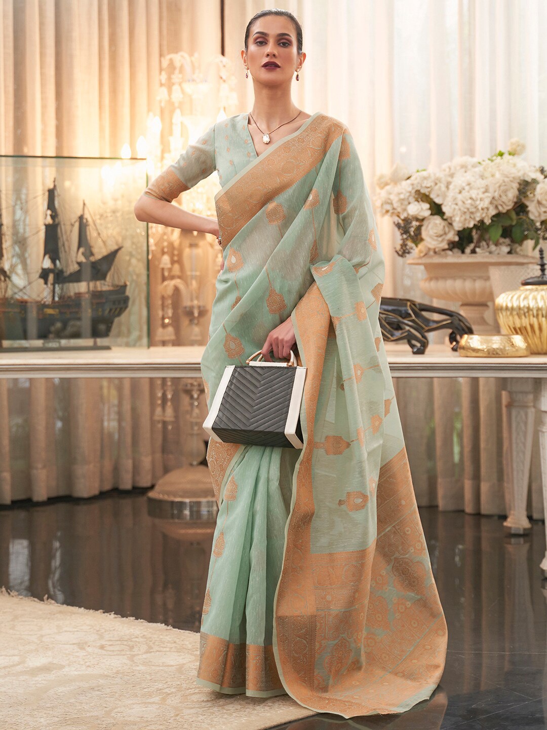 

Mitera Sea Green & Gold-Toned Ethnic Motifs Zari Pure Linen Banarasi Saree