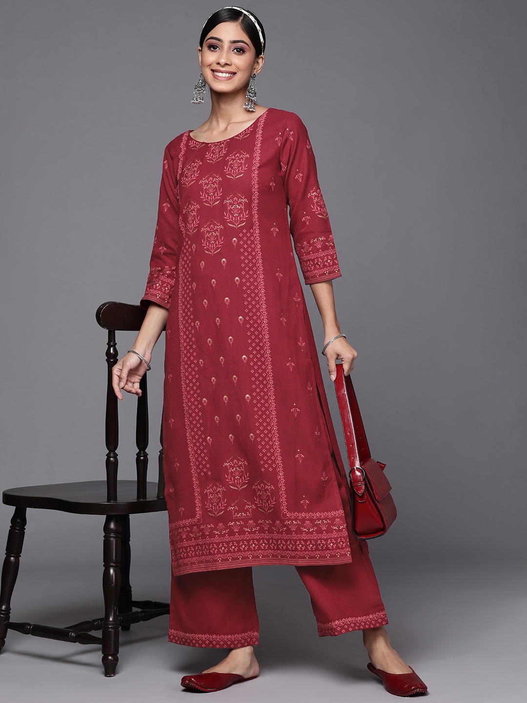 

Indo Era Women Maroon Ethnic Motifs Printed Panelled Kurta with Palazzos
