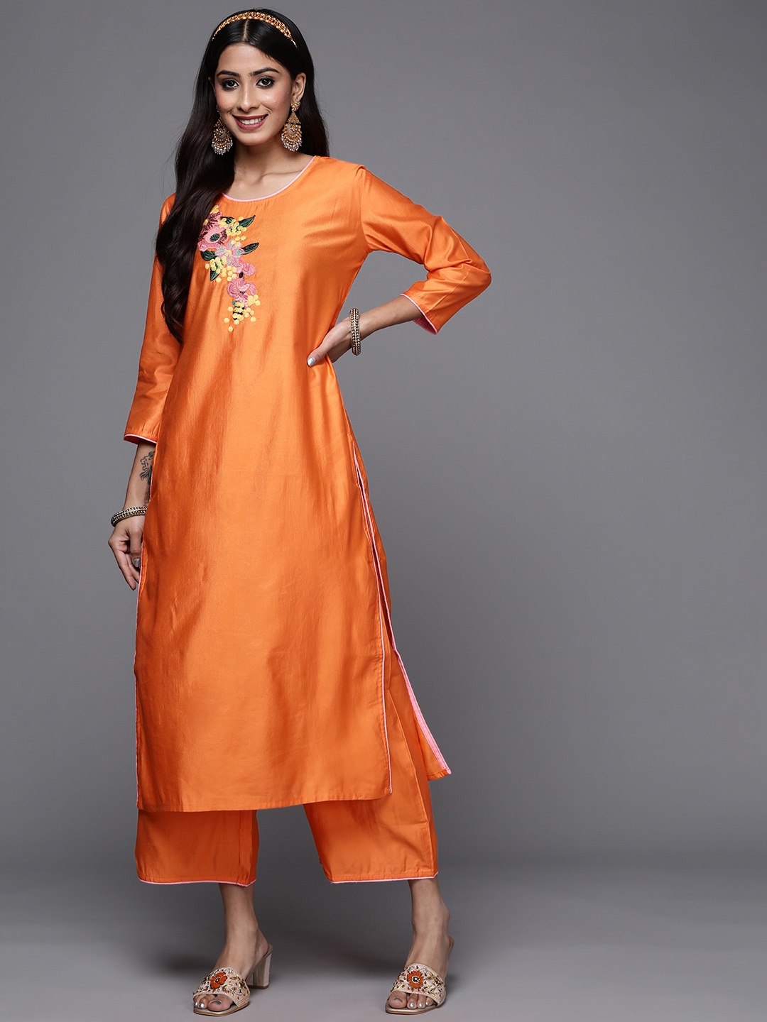 

Indo Era Women Orange Floral Printed Sequinned Liva Kurta with Palazzos