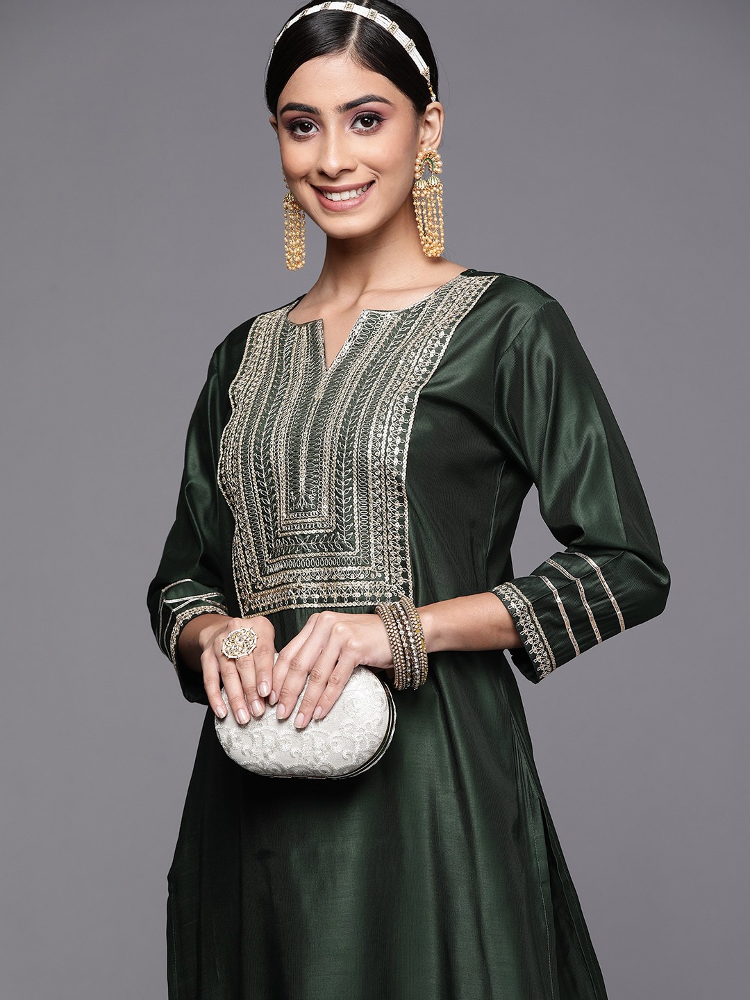 

Indo Era Women Green Ethnic Motifs Yoke Design Sequinned Liva Kurta with Trousers