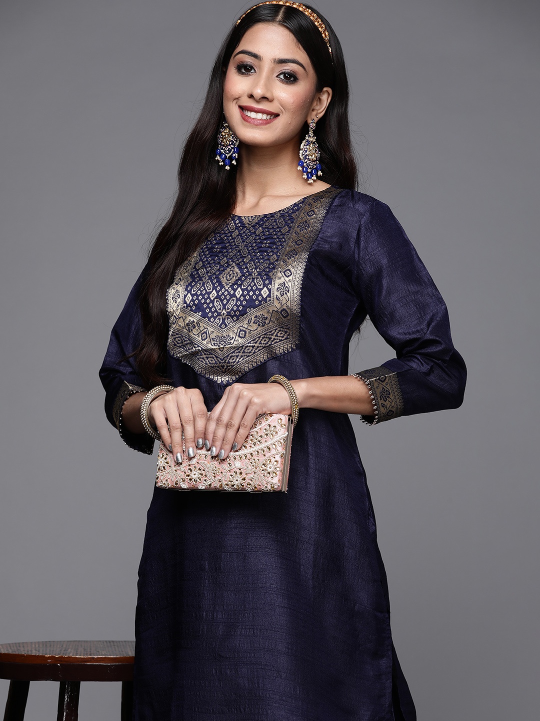 

Indo Era Women Navy Blue Ethnic Motifs Yoke Design Kurta with Palazzos