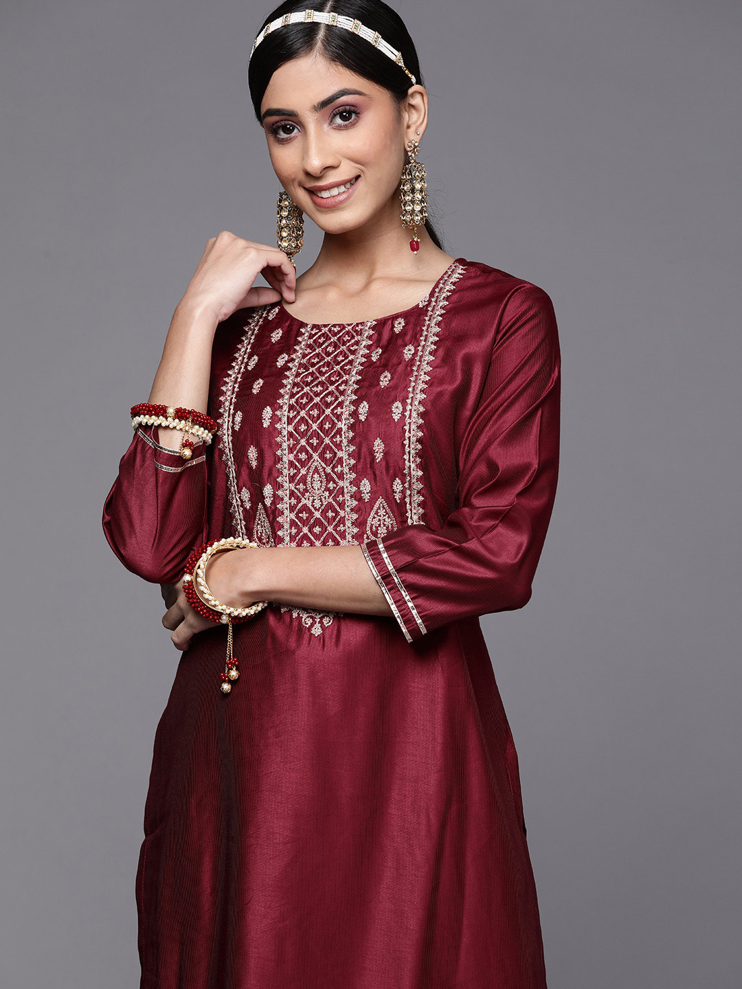 

Indo Era Women Maroon Ethnic Motifs Yoke Design Kurta with Trousers
