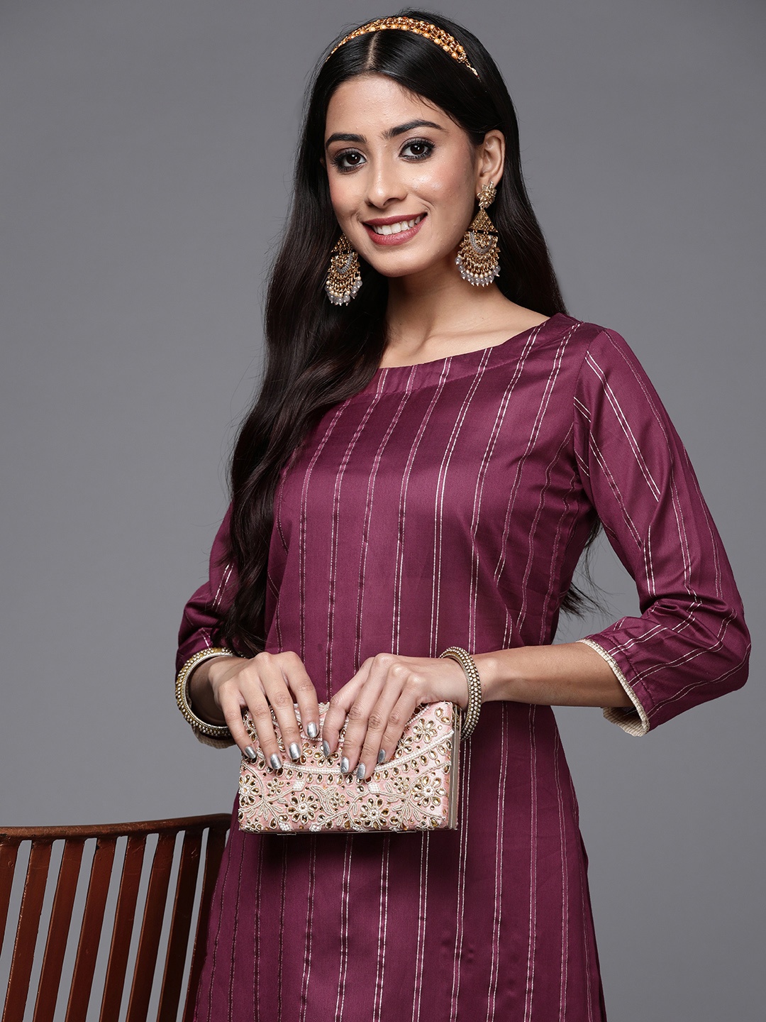 

Indo Era Women Magenta Striped Liva Kurta with Palazzos
