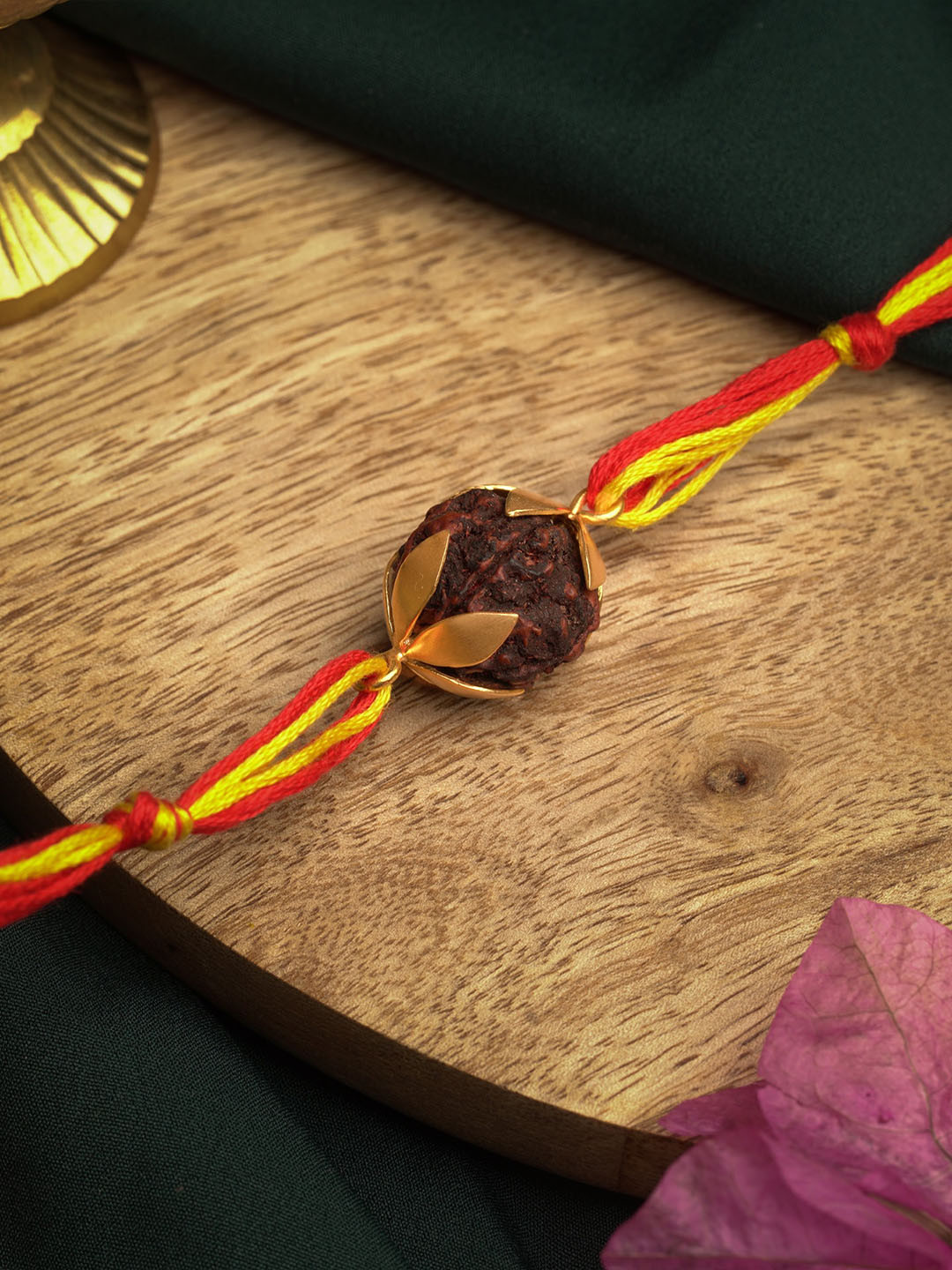 

Suhani Pittie Gold-Plated Red Coloured Rudraksh Beaded Rakhi