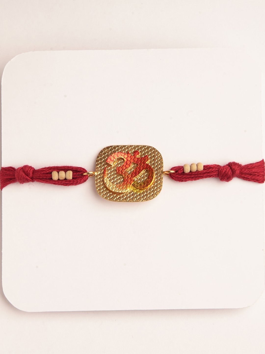 

Suhani Pittie Men 22K Gold-Plated & Red Om & Beads Rakhi