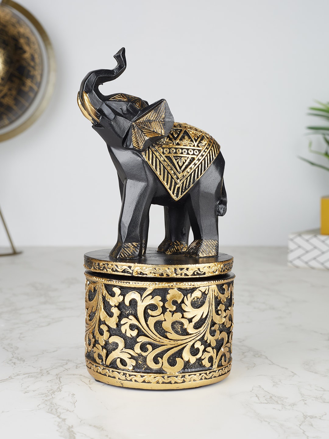 

HomeTown Black & Gold Toned Elephant Showpieces