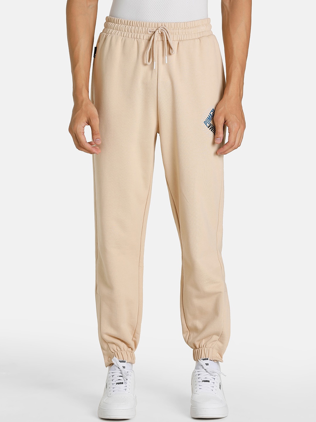 

Puma Men SWxP Relaxed Fit Track Pants, Beige