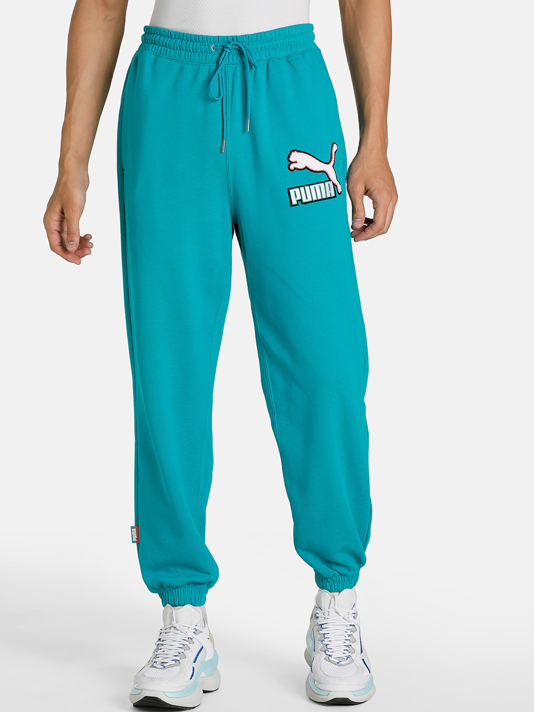 

Puma Men Relaxed Fit Solid Fandom Sweatpants, Green