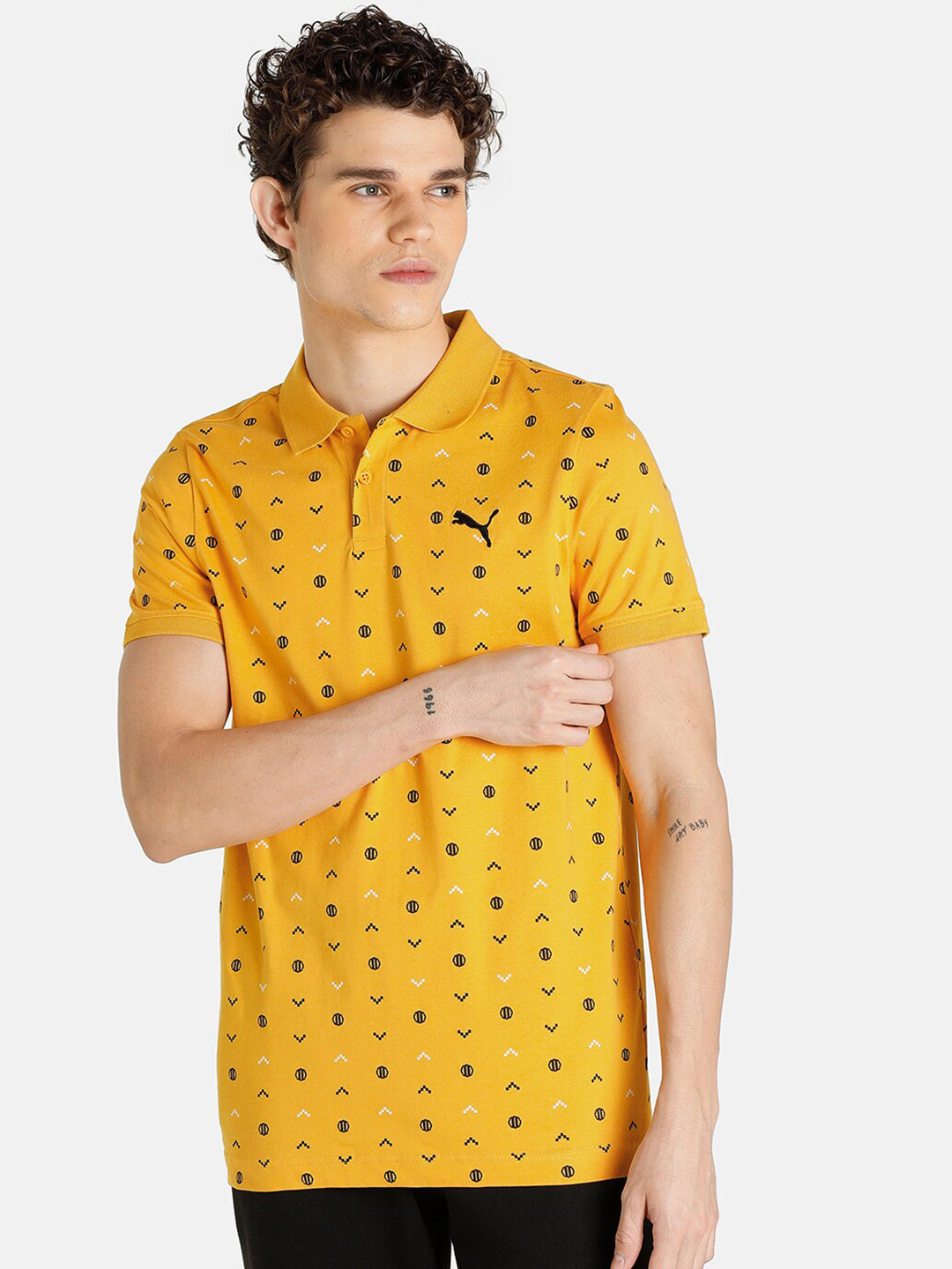 

Puma Men Yellow Solid Pure Cotton T-shirts