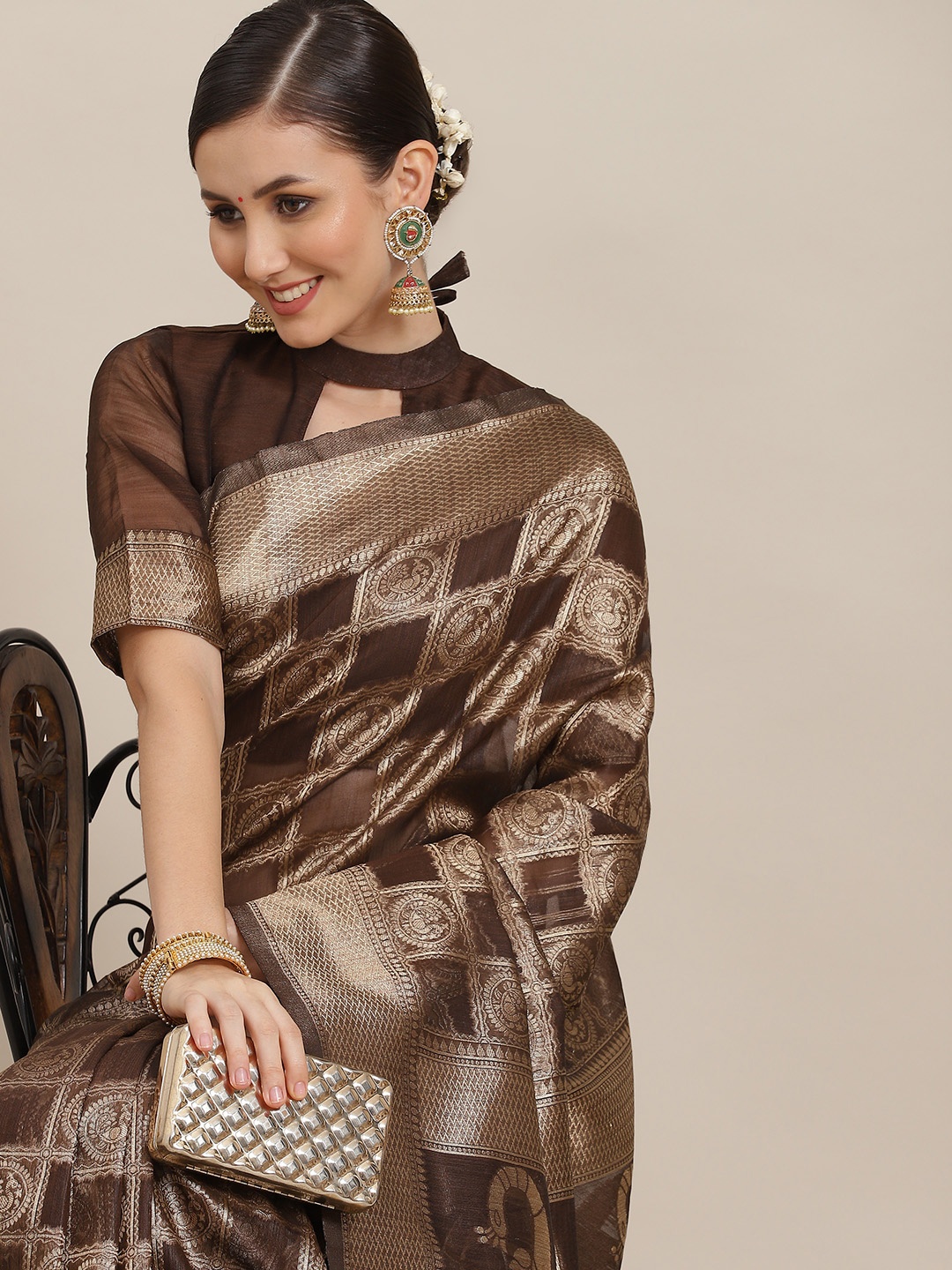 

Saree mall Brown & Gold-Toned Ethnic Motifs Zari Patola Sarees