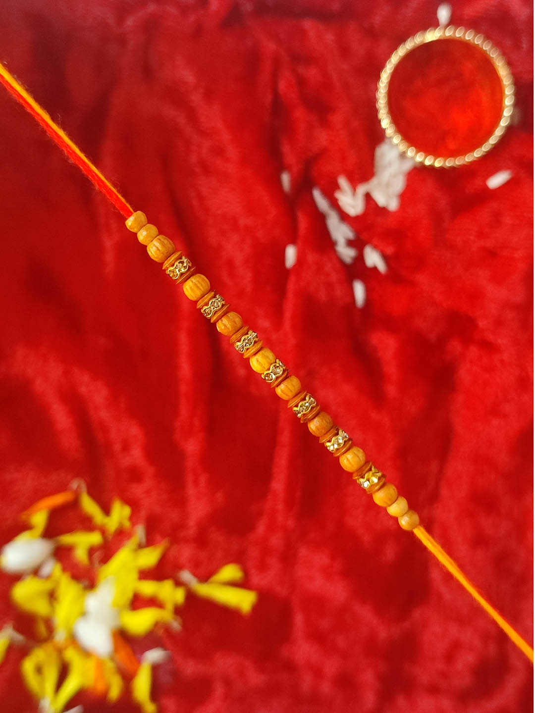 

CRAYTON Men Gold-Toned White & Yellow Stone-Studded & Beaded Rakhi