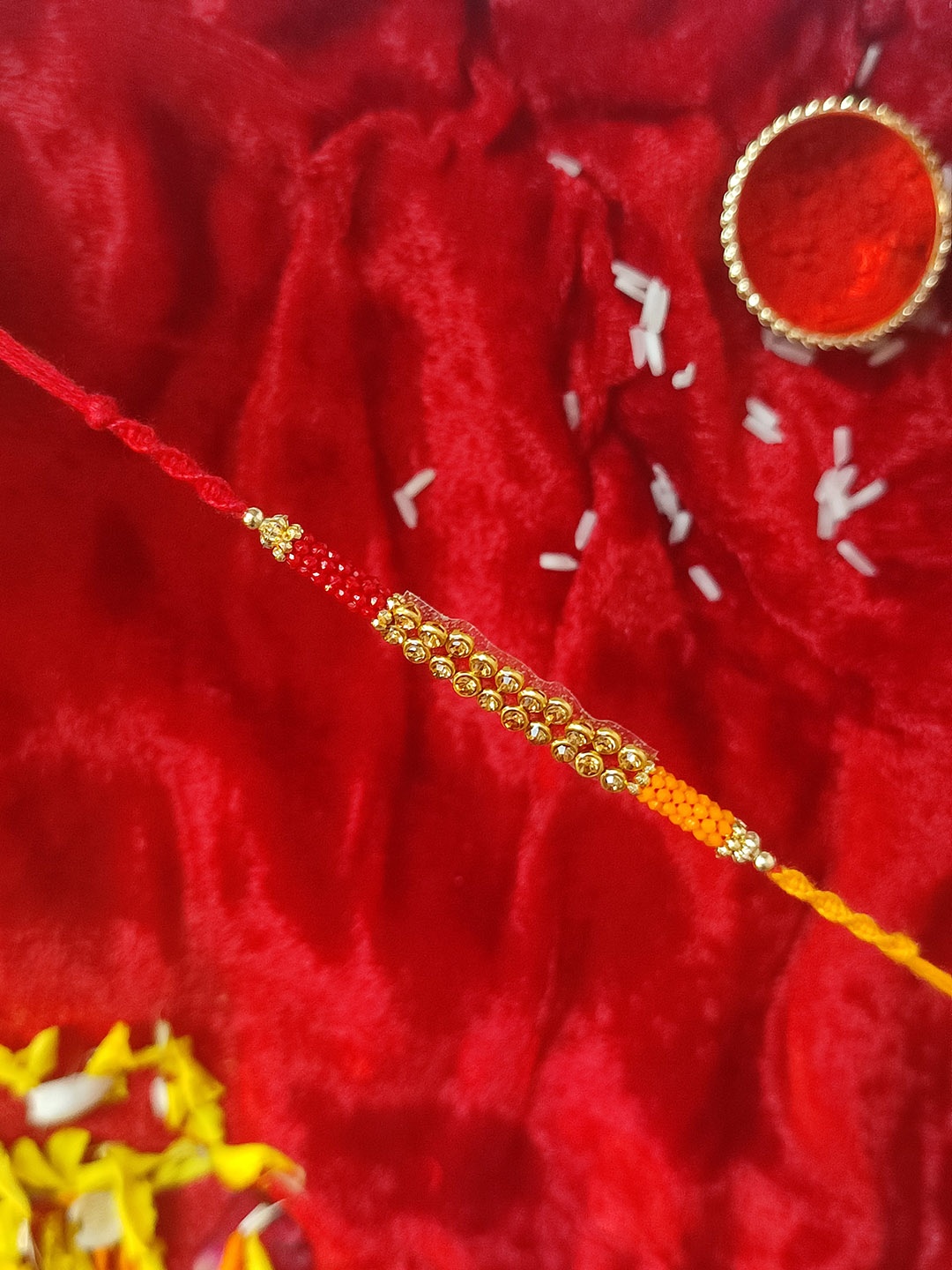

CRAYTON Red Beaded Thread Rakhi