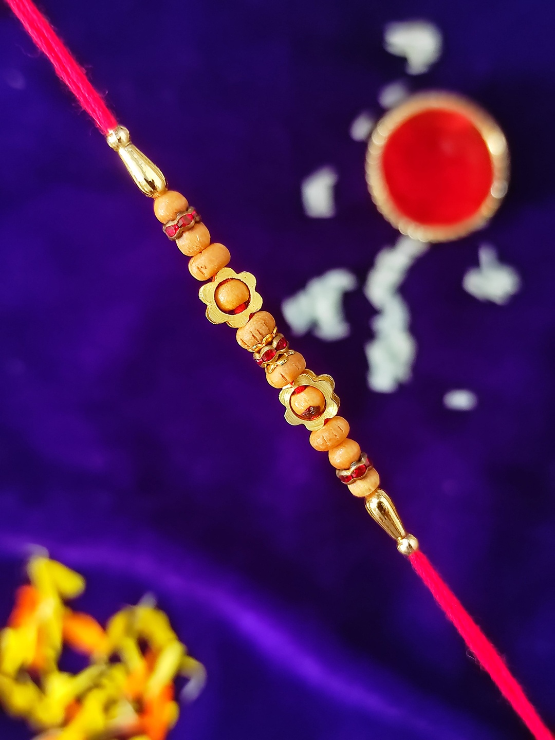 

CRAYTON Red & Gold Coloured Sandalwood Beaded Thread Rakhi