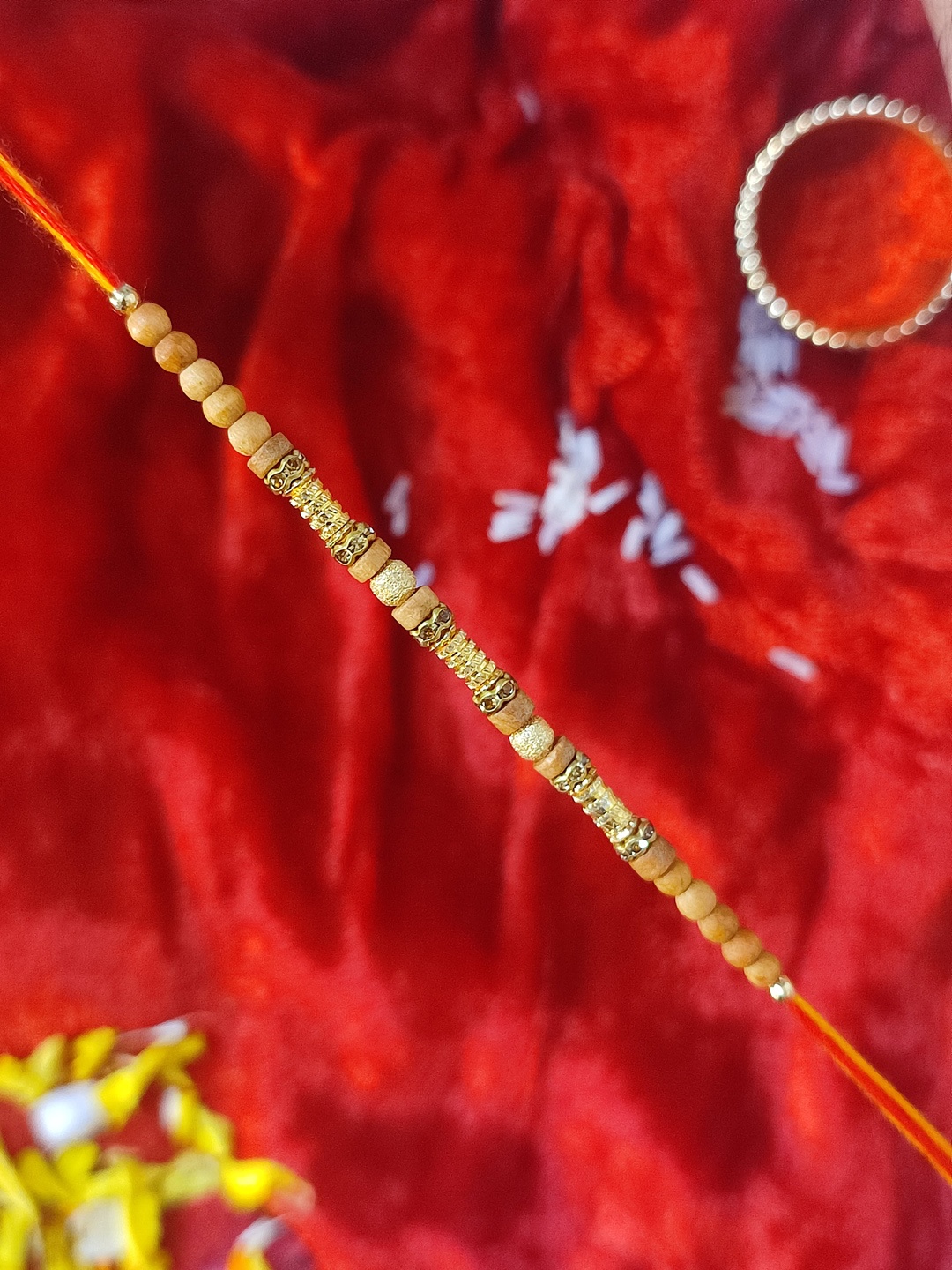 

CRAYTON Men Brown Sandalwood Beaded & Gold-toned Designed Rakhi