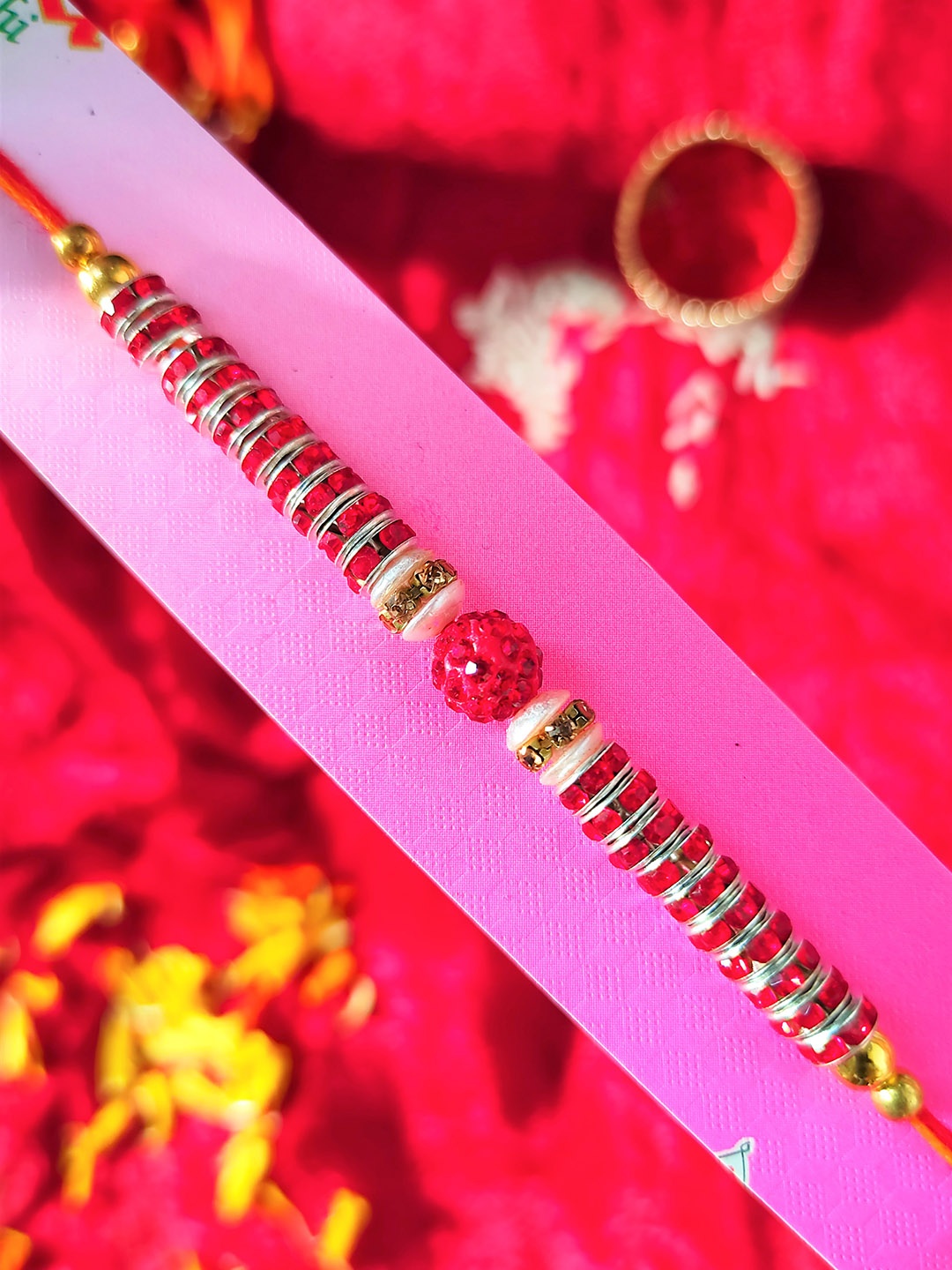 

CRAYTON Men Red String Rudraksh and Stone-Studded Rakhi