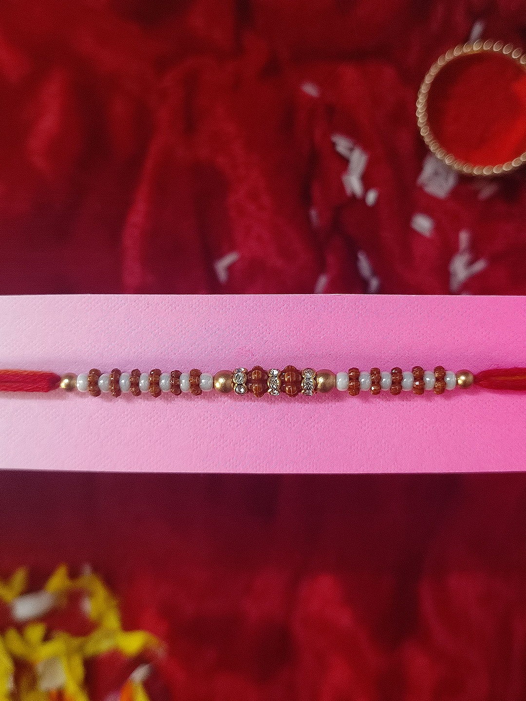 

CRAYTON Gold Toned & Brown Diamond & Pearl Beaded Rakhi