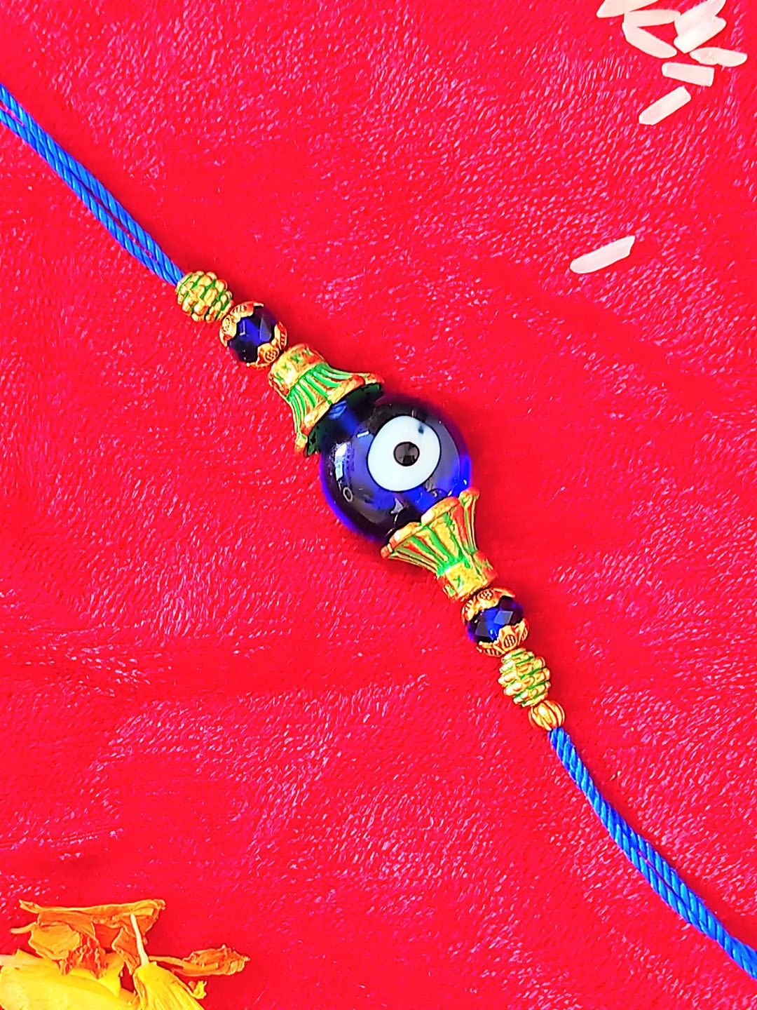

CRAYTON Blue Big Evil Eye-Beaded Thread Rakhi