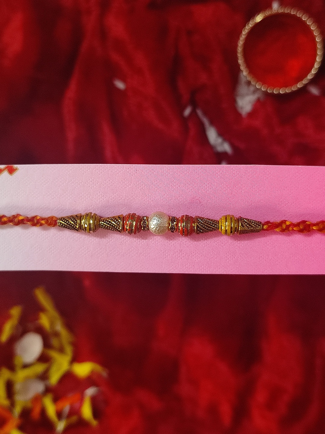 

CRAYTON Men Gold-Toned & Brown Pearl Rakhi