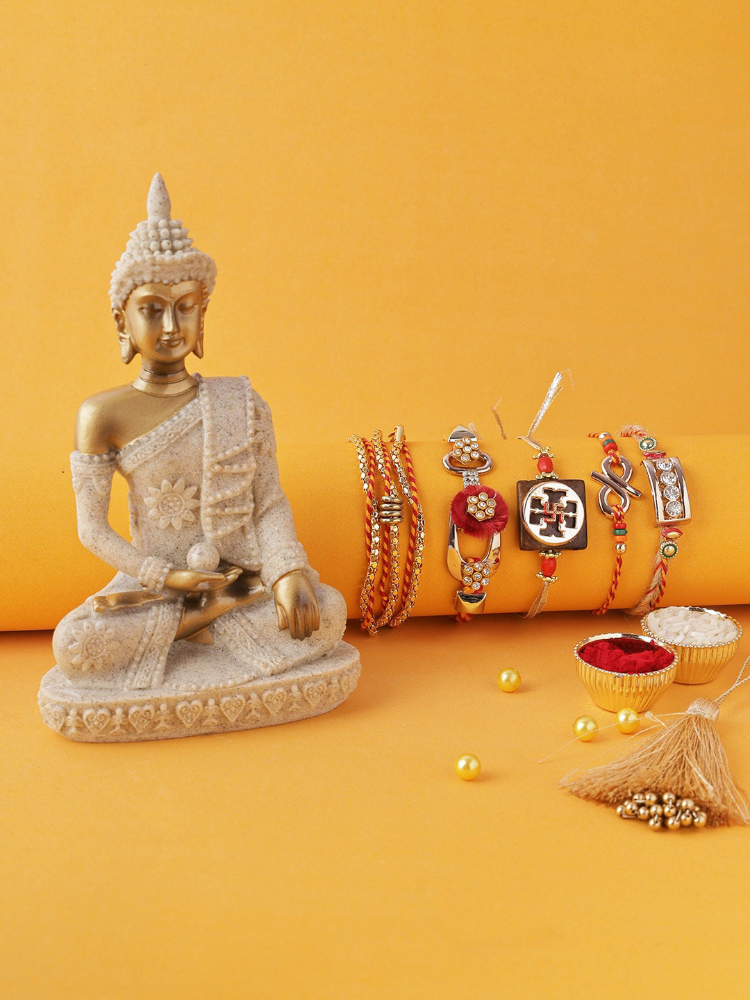 

Aapno Rajasthan Multicolored Rakhi With Meditating Buddha Statue, Multi