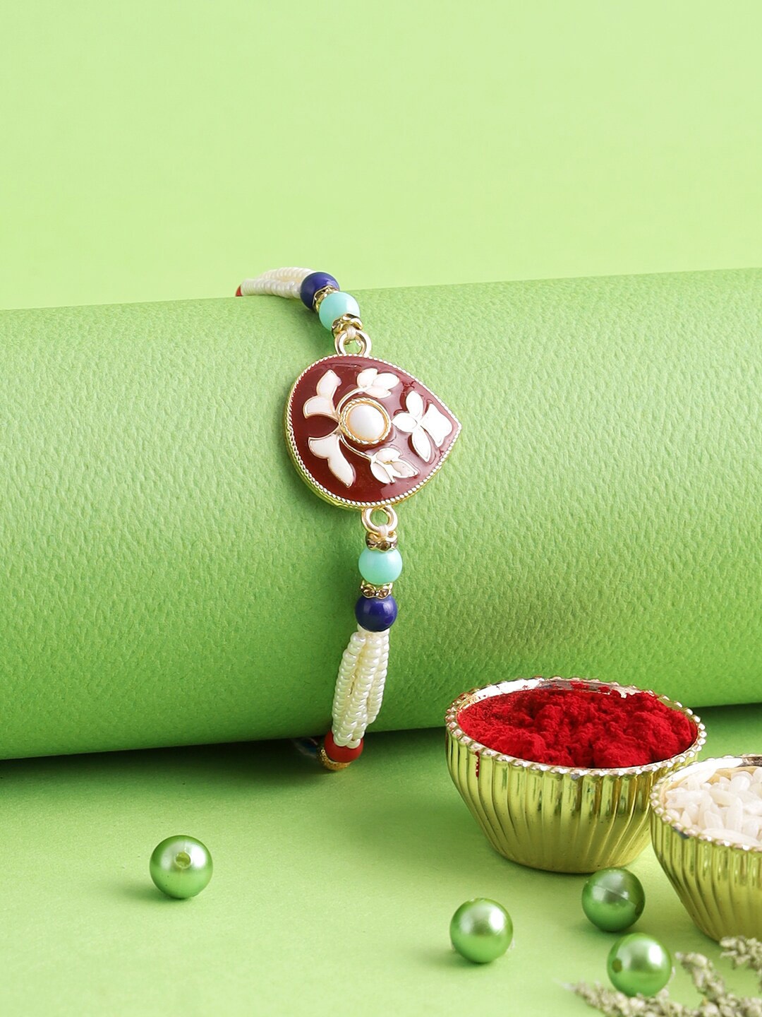 

Aapno Rajasthan White & Blue Meenakari Work Rakhi