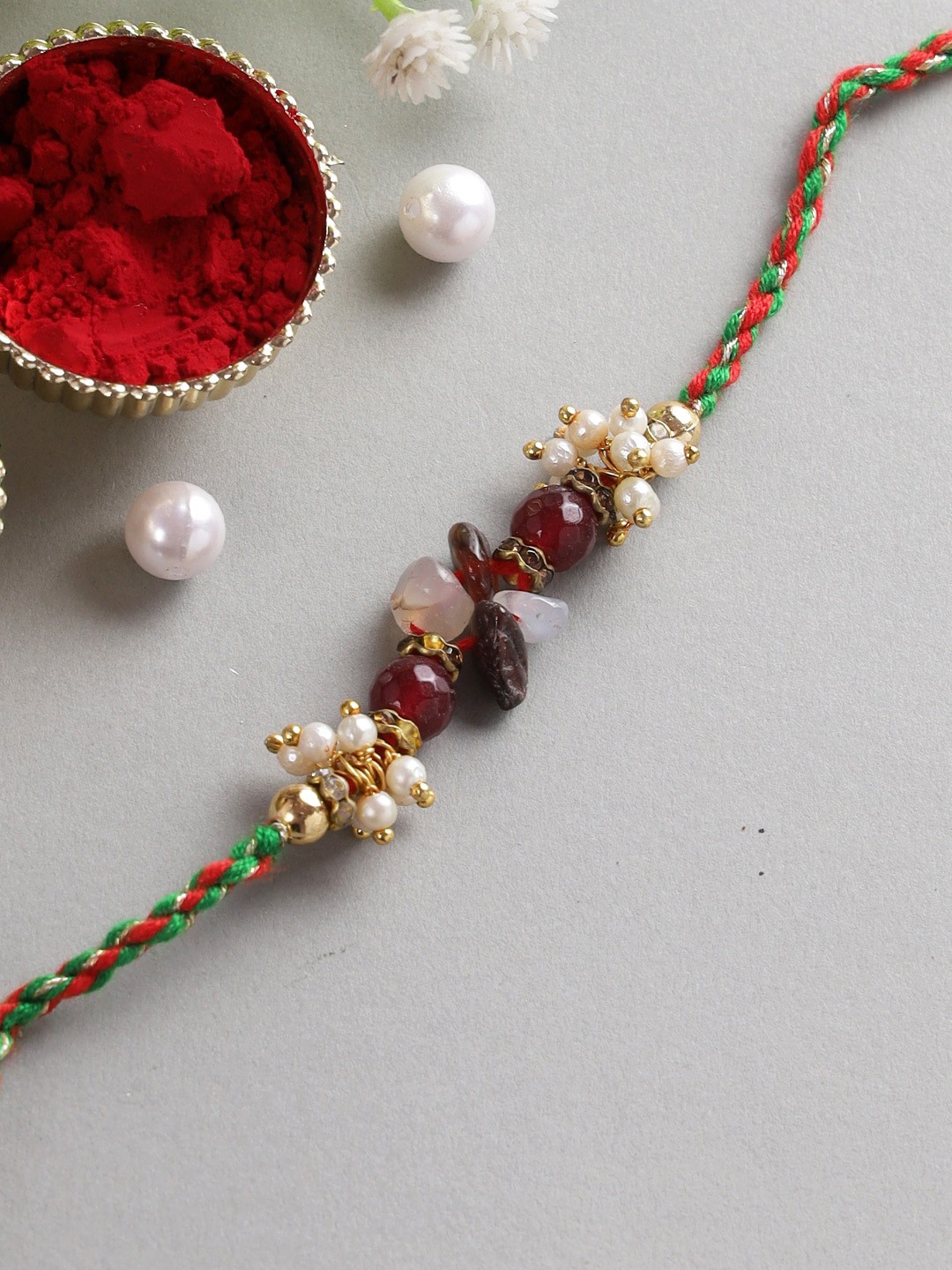 

Aapno Rajasthan Maroon & White Beaded Bhaiya Rakhi Pack