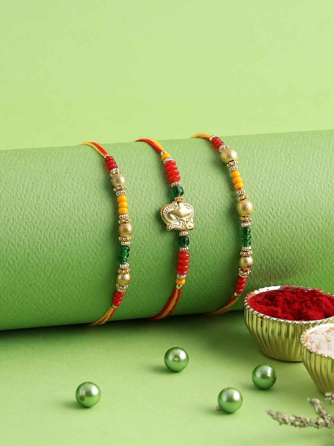

Aapno Rajasthan Set of 3 Gold-Toned & Red Beaded Rakhi