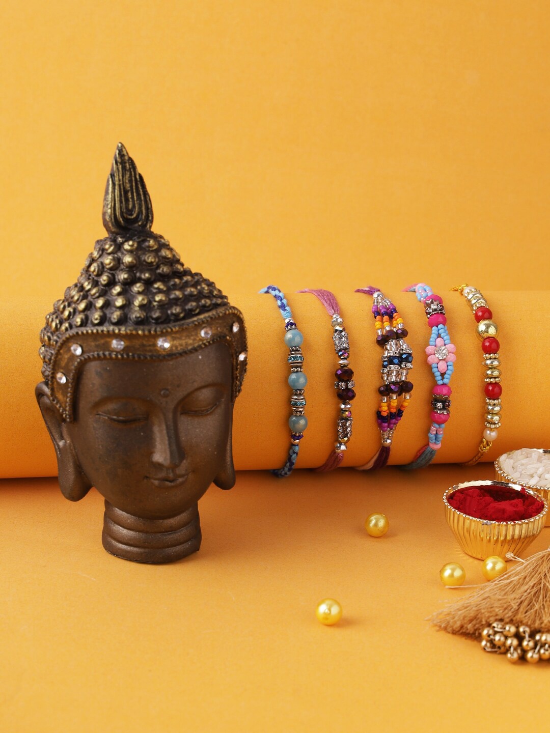 

Aapno Rajasthan Set of 5 Rakhi with Elegant Minimalist Buddha Resin Art, Red