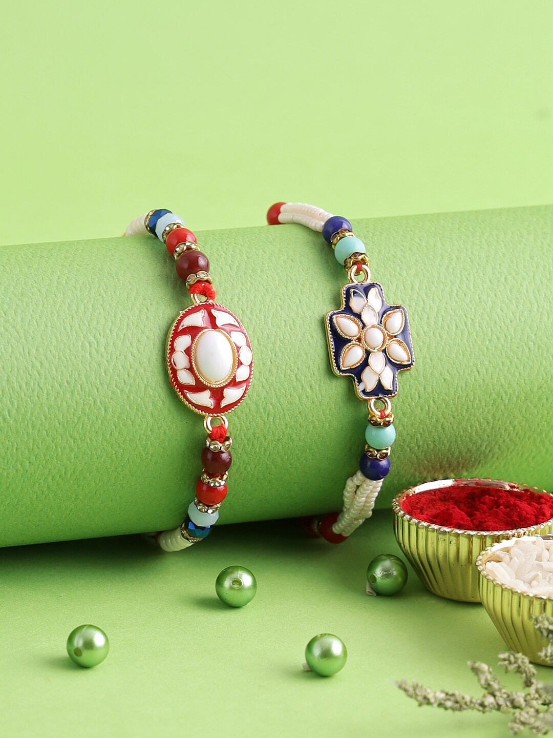 

Aapno Rajasthan Set of 2 White & Red Meena Work Bhaiya Rakhi