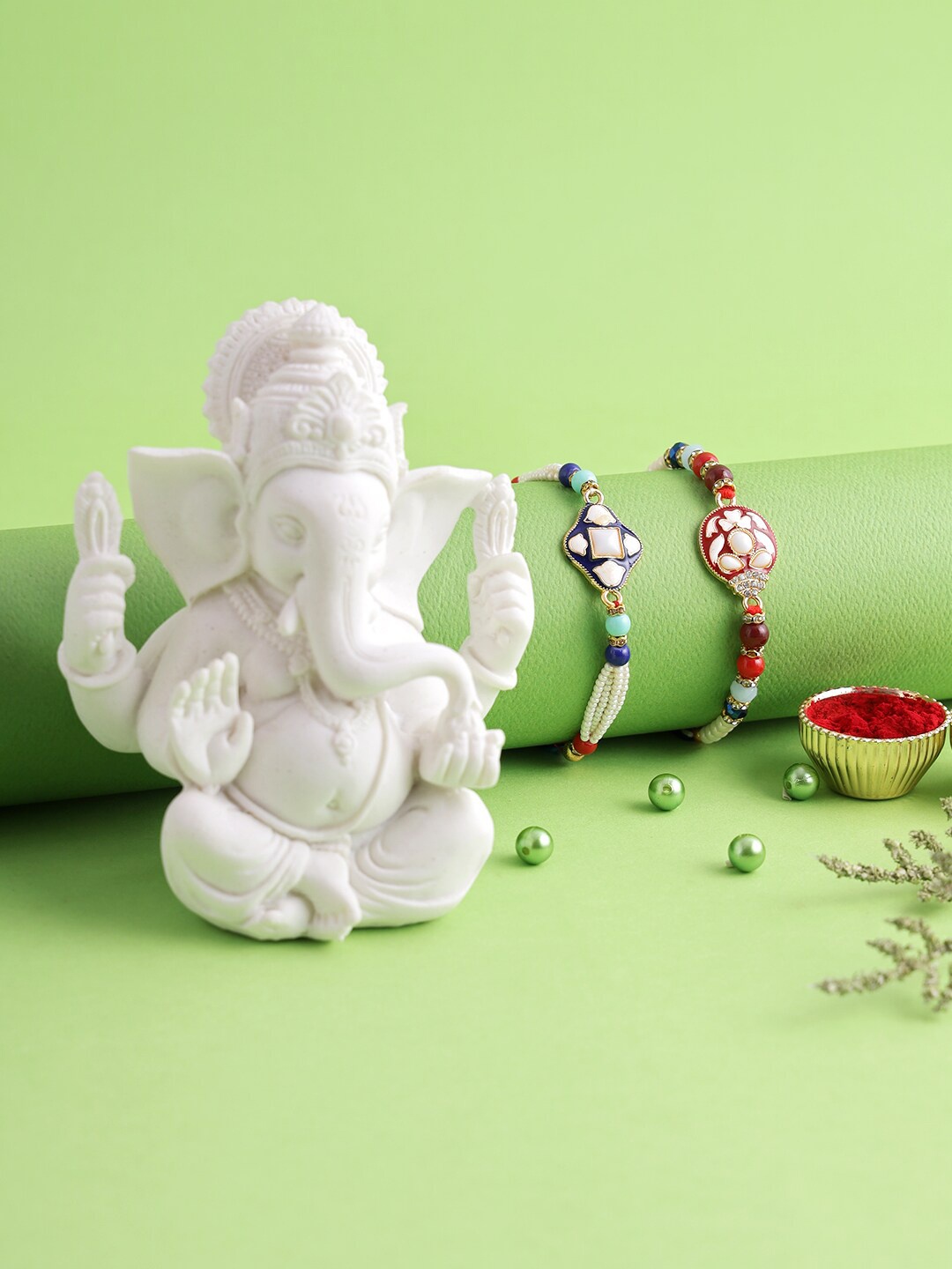 

Aapno Rajasthan Set of 2 Meena Work Rakhi Gift Set, Multi