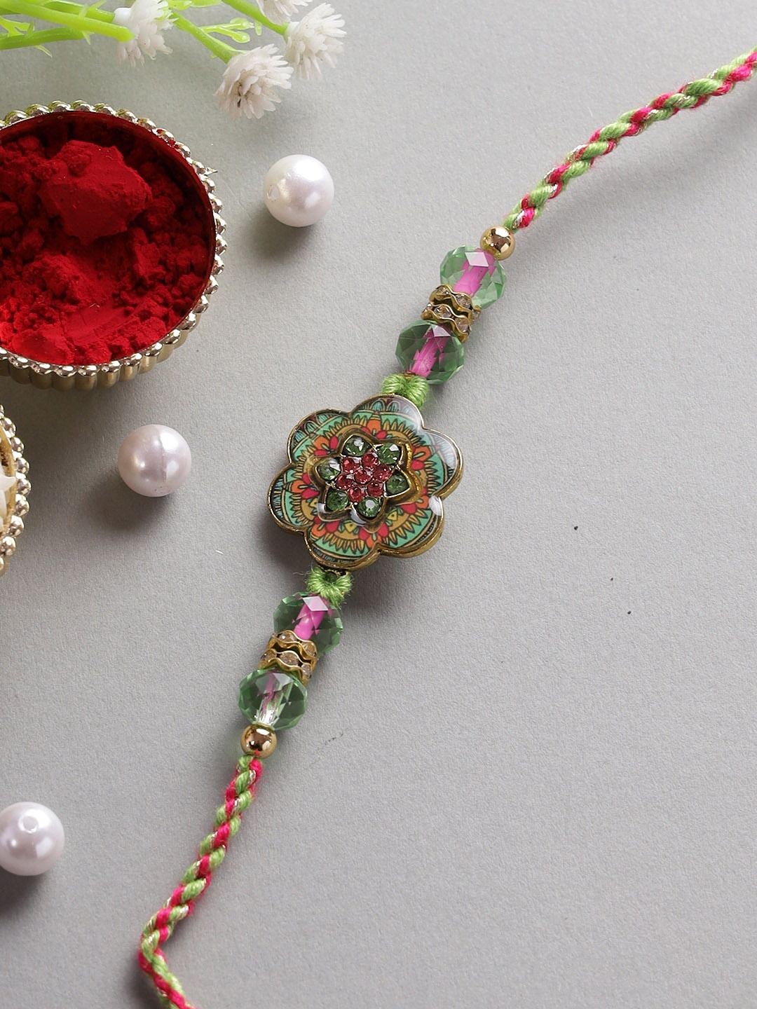 

Aapno Rajasthan Green & Pink Stone Studded Bhaiya Rakhi