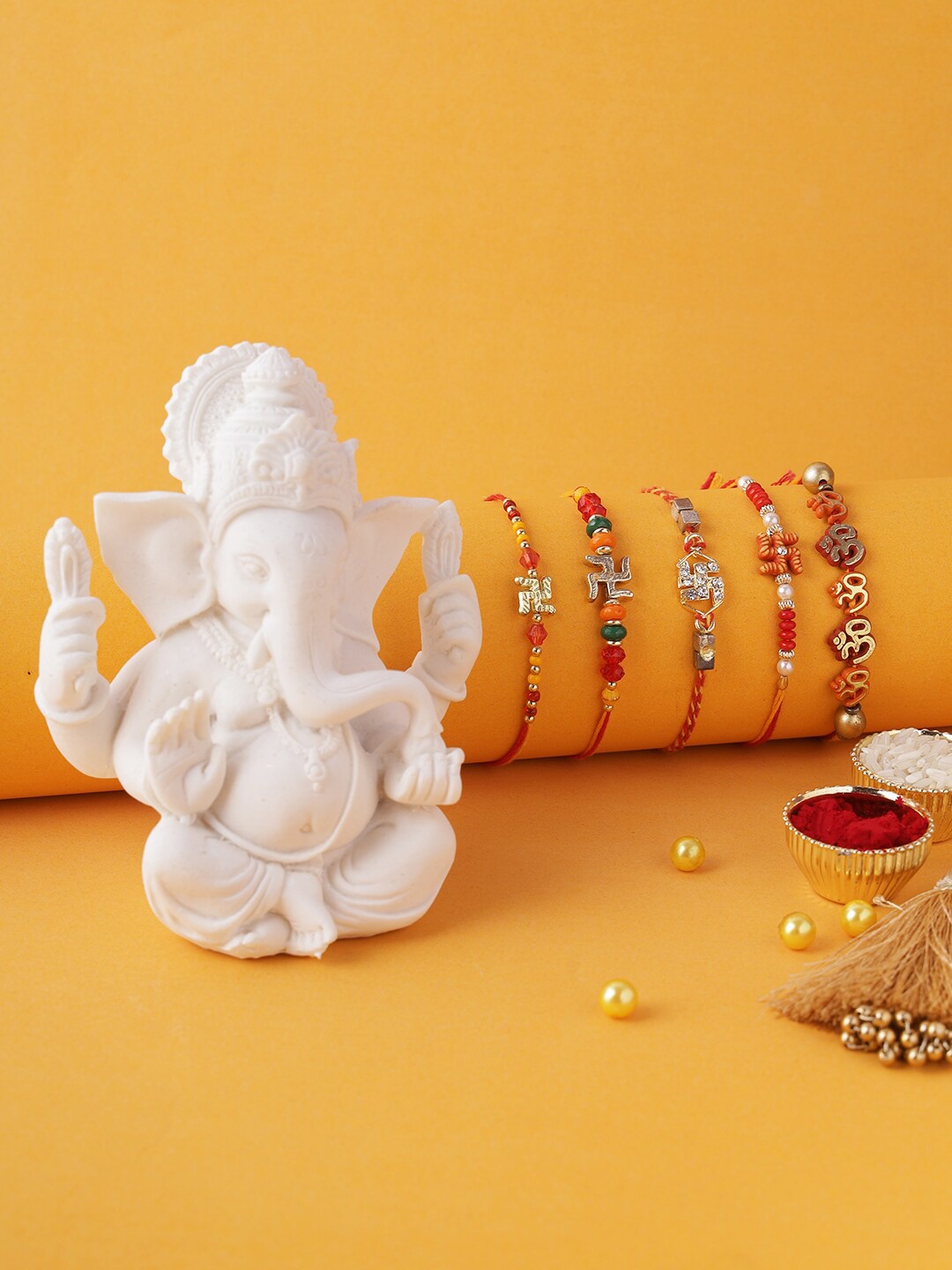 

Aapno Rajasthan Set of 5 Rakhi with Polyresin Ganesha Idol, Gold