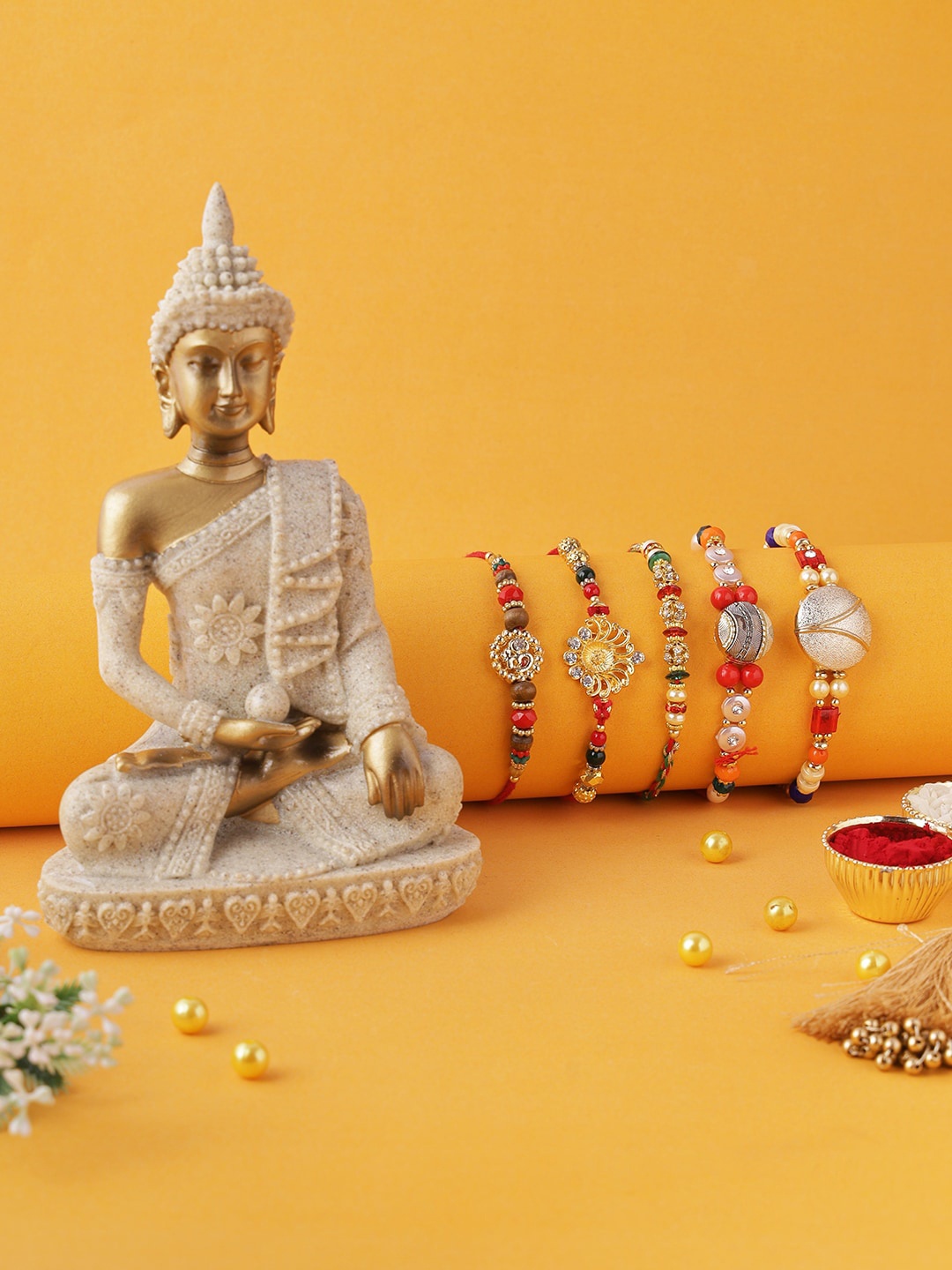 

Aapno Rajasthan Set of 5 Rakhi & Buddha Statue, Multi