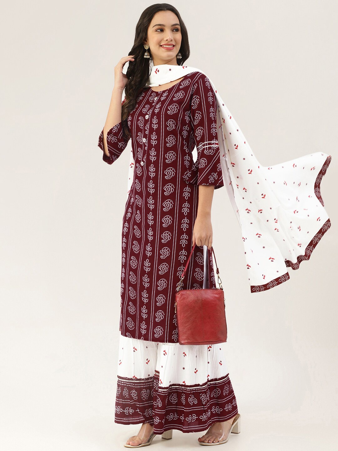 

Lee Moda Women Maroon Ethnic Motifs Printed Layered Kurti with Skirt