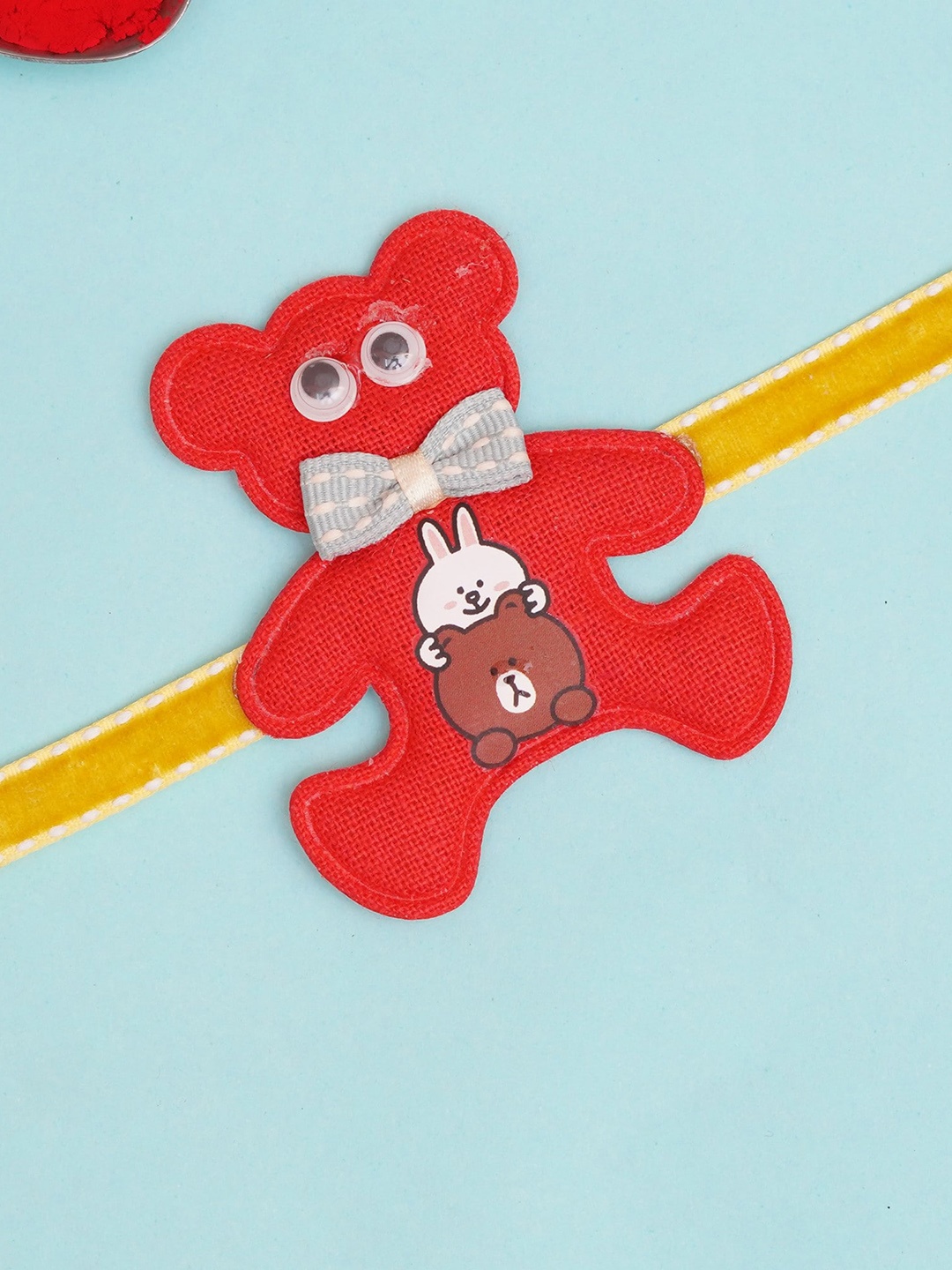 

The Magic Wand Red & Yellow Teddy Thread Rakhi