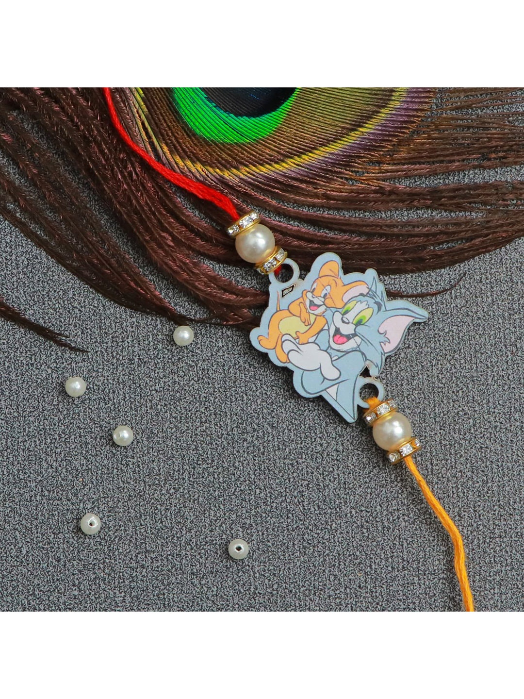 

The Magic Wand Red & Blue Tom & Jerry Thread Rakhi